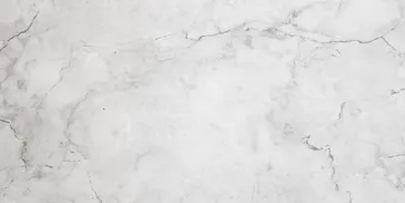 A white marble surface with some type of pattern